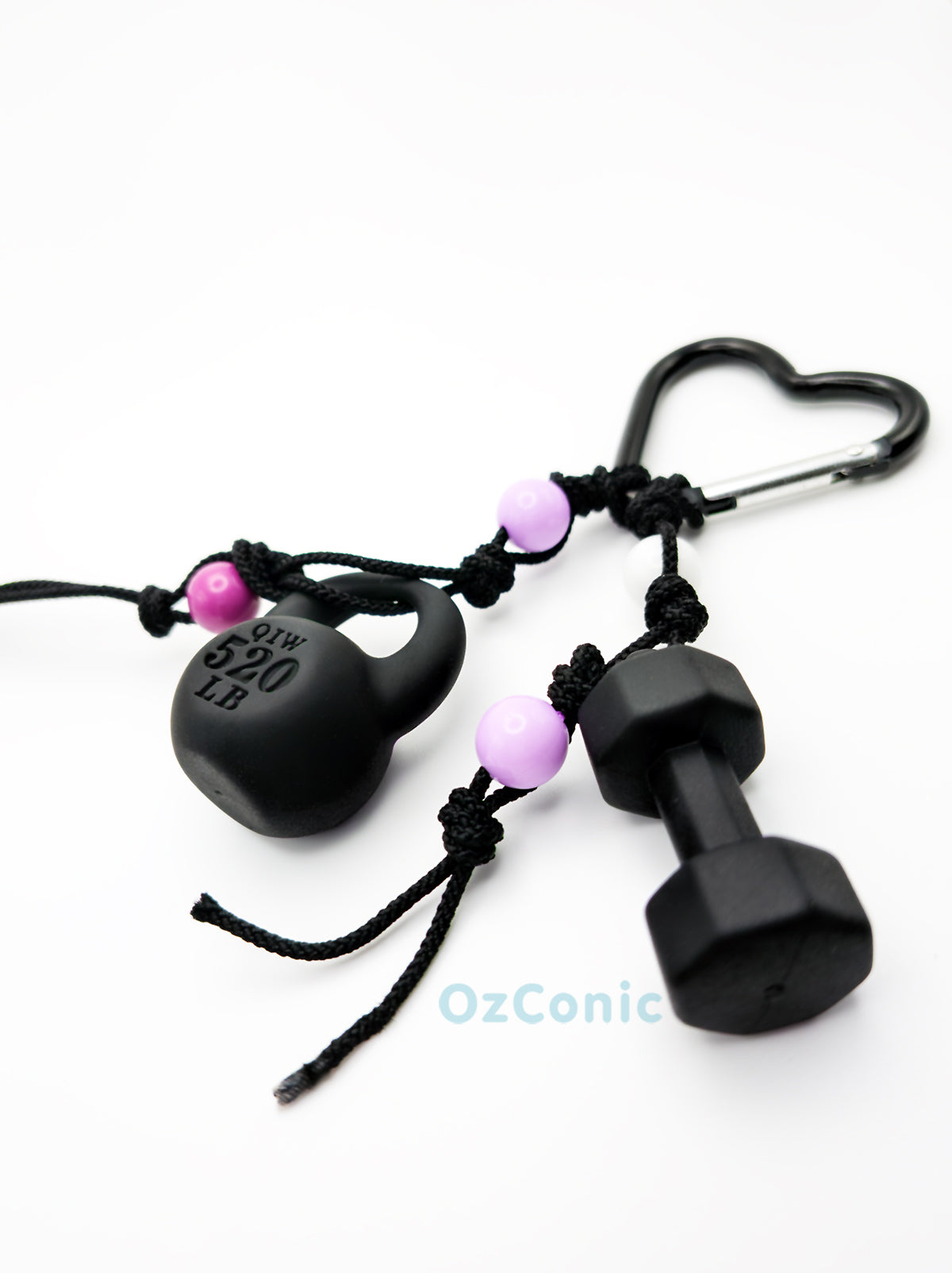 Black dumbbell and heart-shaped weight with pink beads
